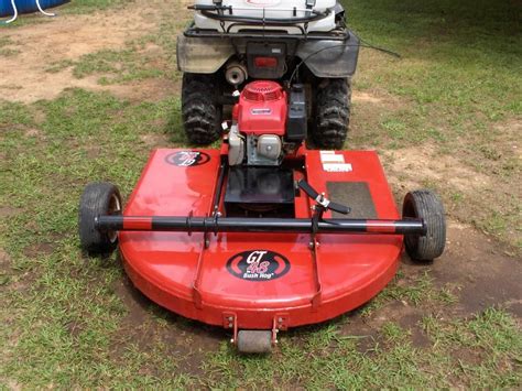 Four wheeler bush hog - Shipping: Factory shipped. See Shipping Options. Store Pickup: Not Available. Check stores. 344cc Briggs & Stratton Powerbuilt OHV engine. 44in.W, 11-ga. steel deck with two breakaway swinging blades. Single-point cutting height …